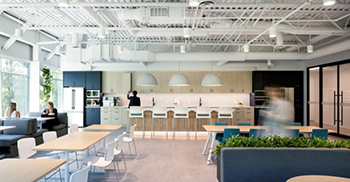 办公室装修效果：整体氛围明亮而开放 裸露的天花板营造出工业气息