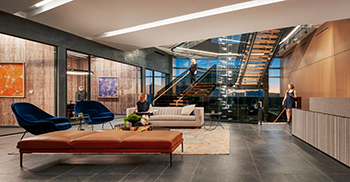 办公楼设计装修风格：中性、温暖的调色板与会议室附近的深色石板形成鲜明对比